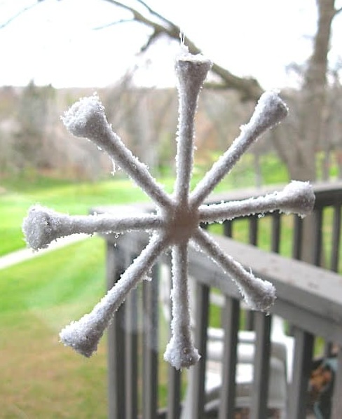 Snowflake ornament hanging in the window