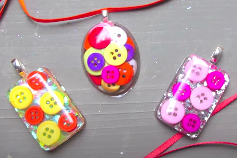 Finished resin charms using buttons for making