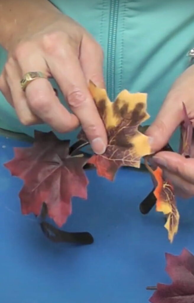 what to do with fall leaves...attach them to a hair bow hair accessory