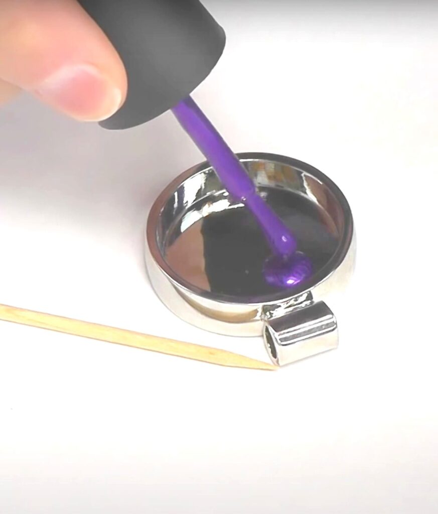 How to make nail polish jewelry | Dripping purple nail polish into silver bezel