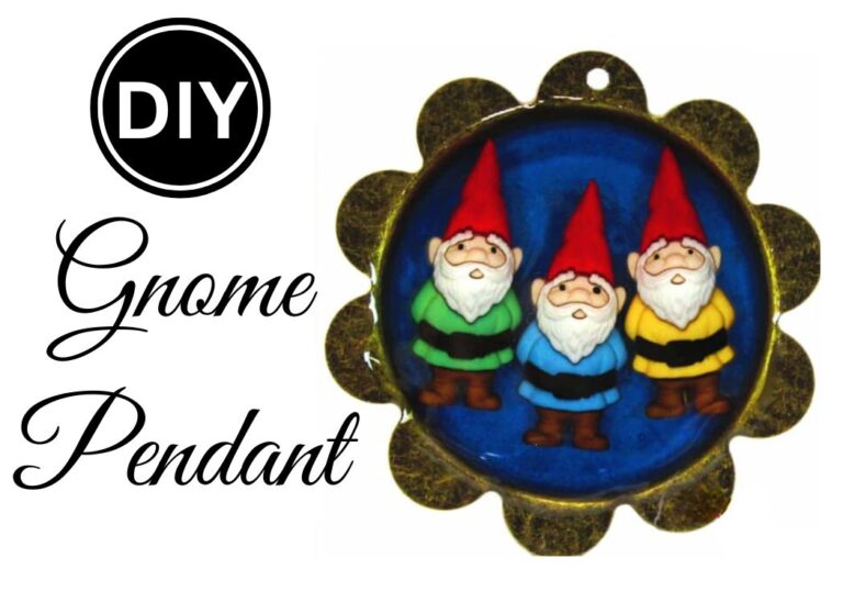 Resin pendant with three gnomes