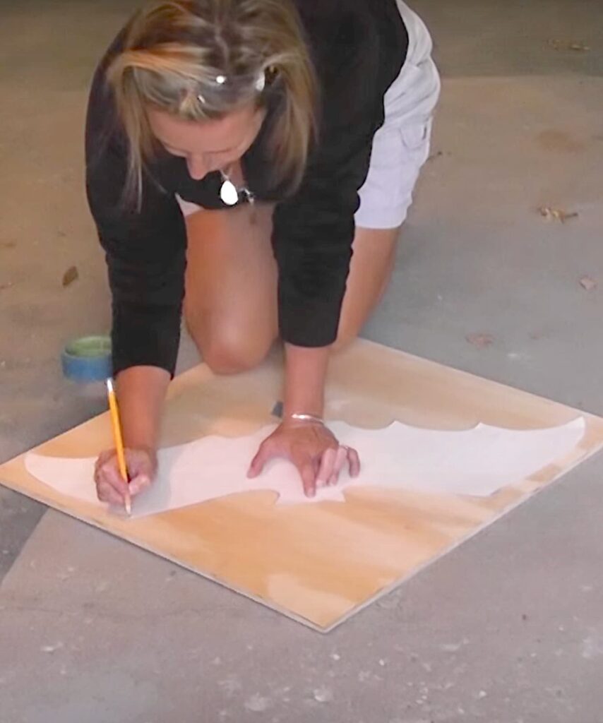 Trace wood bat template onto plywood