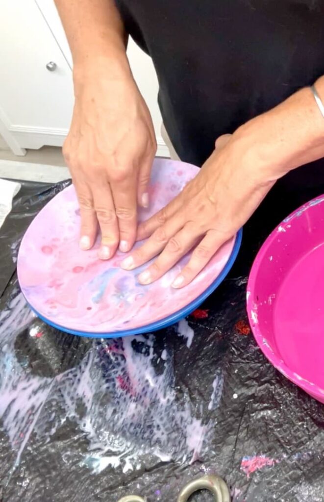 Pressing resin round into a bowl to create a resin bowl