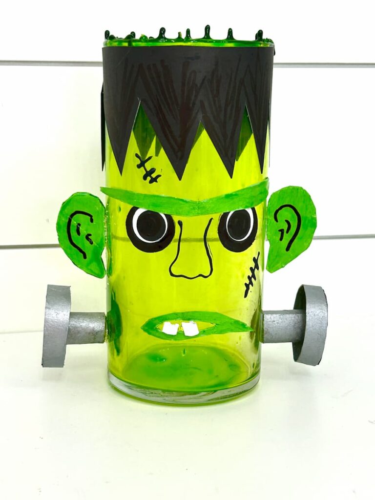 Completed Halloween Frankenstein made out of a vase. It's a dollar tree diy