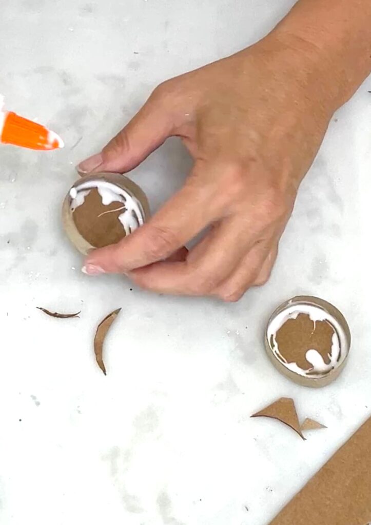 Adding glue to the inside of cardboard bolts