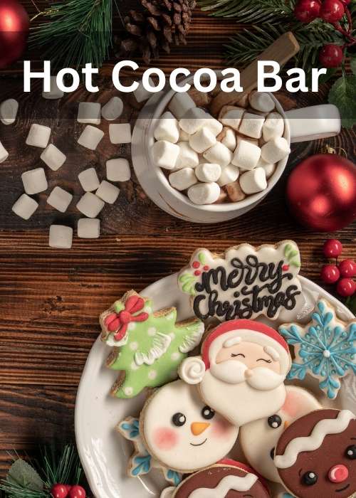 Hot cocoa bar with christmas cookies and hot cocoa full of marshmallows