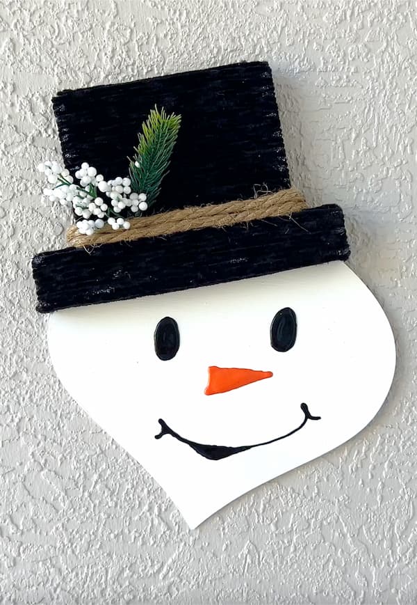 Results on how to make a dollar tree snowman craft with white berries in his hat