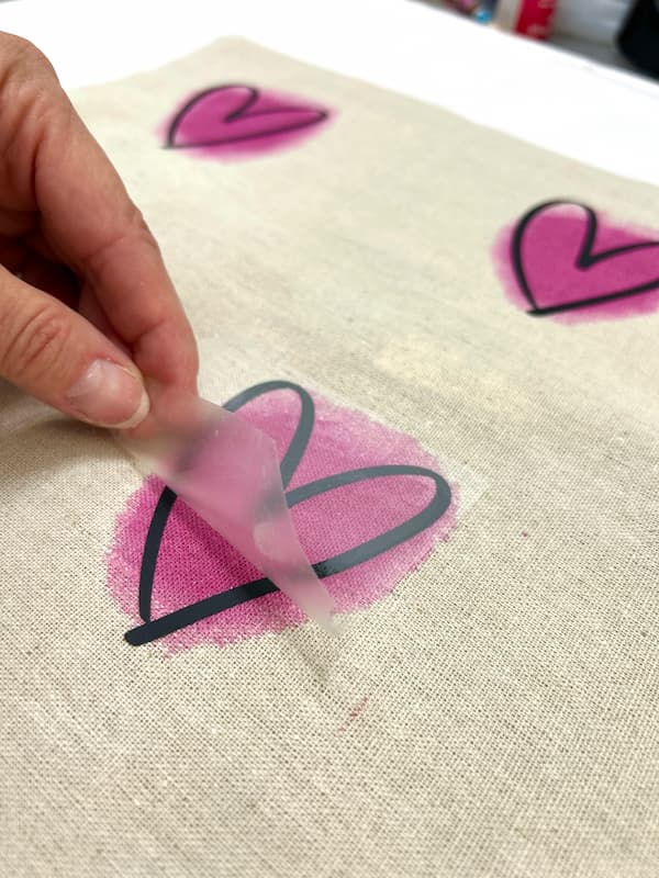 Removing the plastic from the iron on hearts Valentine's Day pillow cover