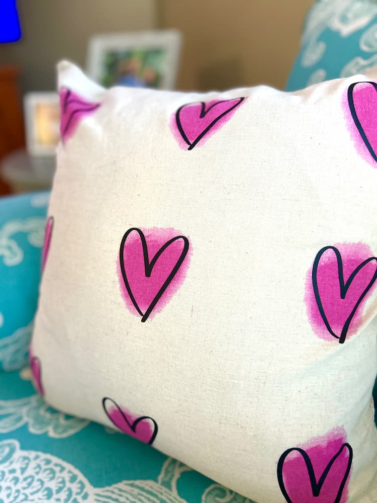 Valentine pillow on blue chair